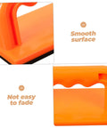 Close-up image of the orange Safety Push Block for Table Saws and Router Tables showing smooth surface and handle detail.