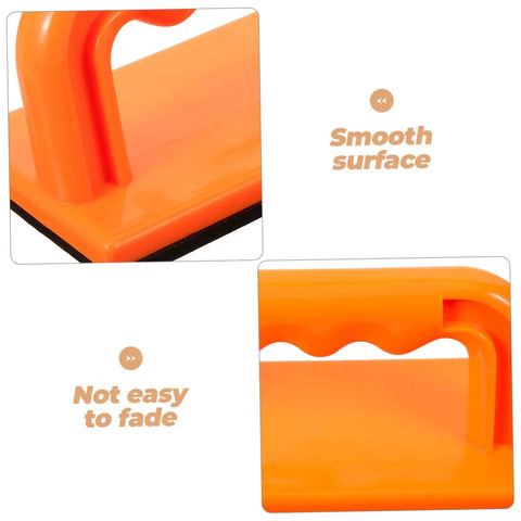 Close-up image of the orange Safety Push Block for Table Saws and Router Tables showing smooth surface and handle detail.
