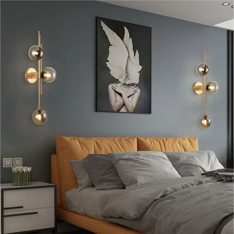 Mid Century Modern Indoor 3 Light Globe Wall Sconce With Smoke Gray Glass Shade And Brushed Brass Finish Vertical Vanity Lamp For Modern Bathrooms Retro Handblown Glass Look Elegant Gold Accents above bed in bedroom
