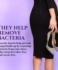 Woman holding shoes with Ultra Thin Sweat And Odor Absorbing Shoe Inserts For Women Size 8-9 Midnight Black inside.