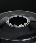 Close-up of a clear plastic 2 Pack Freewheel Spoke Protectors 138mm Diameter For Mountain And Road Bikes Flywheel Guard