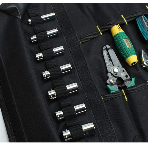Close-up of roll up tool organizer with 20 interior pockets and 15 socket slots, featuring heavy duty 600D polyester material.
