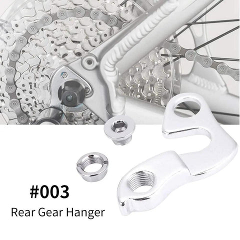 Rear Derailleur Hanger For Mountain Bike Aluminum Alloy Dropout Adapter with screws displayed next to bike gear mechanism