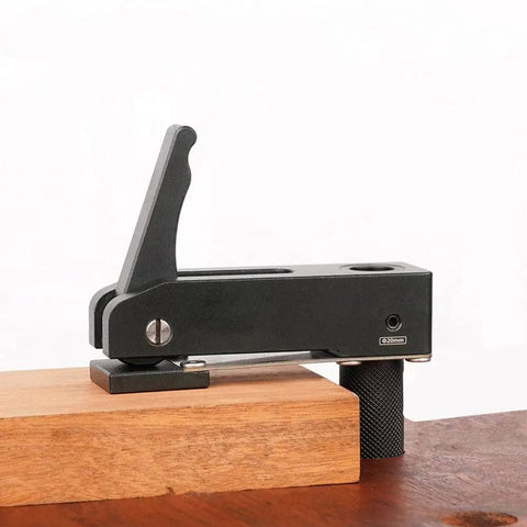 Image of Lengthened Three Quarters Inch Dog Hole Hold Down Clamps Set Aluminum Alloy Bench Dog Clamps for Woodworking MFT Tables and Workbenches Easy Clamp and Release Heavy Duty Two Pack holding wooden piece