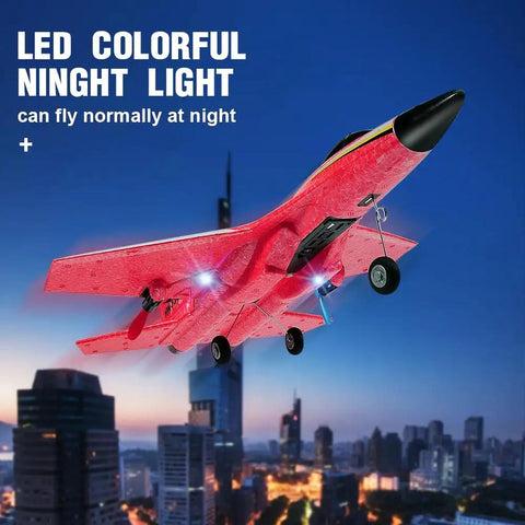 Su-27 RC Airplane With Gyro Stability, Rad 2 Channel Remote, Night Lights flying over cityscape at dusk