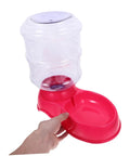 Chill Out As Your Furry Buddies Chow Down On This Pink 3.5L Automatic Pet Feeder And Water Bowl Station featuring a person holding it.