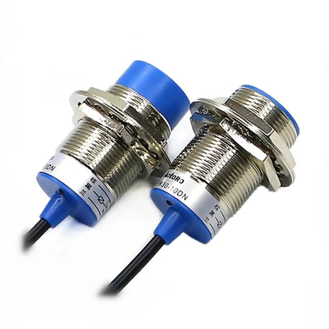 Go-To Proximity Sensor FR30-15DC With Cable For Motion Detection And Photoelectric Sensing Industrial Automation Ready Rugged Build Easy Install High Reliability Ideal For Conveyor Systems And Safety Interlocks, two blue-capped metal sensors