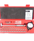 Oudtinx dial bore gauge set in red case with 2-6 inch range dial indicator and multiple measuring rods.