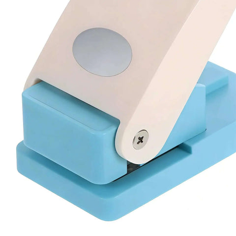 Close-up of Portable Oval Tab Punch For Scrapbooking And Card Making with smooth cut steel blade and easy grip handle