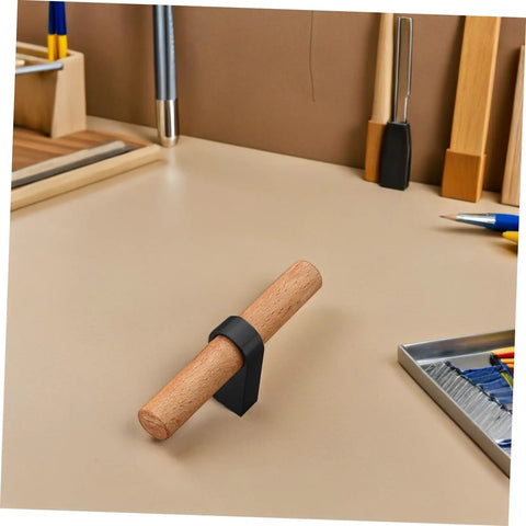 Solid Wood Cabinet Handle Black Drawer Pulls With Single Hole on a workspace, showcasing modern flat front design for kitchen use.