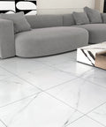 Living room with gray sofa on Peel And Stick White Marble Vinyl Floor Tiles 12x12 Inch 1mm Thick Waterproof Self Adhesive Flooring