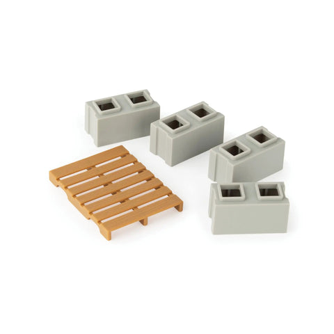 Cement blocks and pallet from John Deere 1:16 Scale Farm Construction Set With Skid Steer And Chevy Silverado Lights, Sounds And Barricades