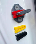Silicone Car Door Damper Pads 12 Pack Slams Free Sound Deadening Buffers on door latch with red, yellow, and black seals.