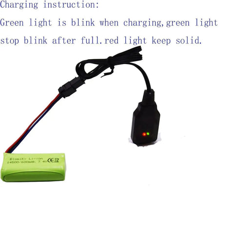 7.4V 2S 600mAh RC Battery With SM-3P Plug And Cable, shown connected to a charger with indicator lights