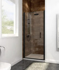 Slick Matte Black Frameless Pivot Shower Door Featuring Thick Clear Tempered Glass And Smooth Reversible Swing Action For A Straight Up Bathroom Upgrade in modern bathroom.