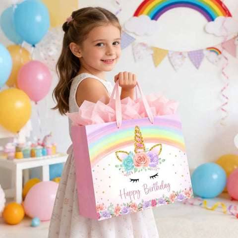 Girl holding 13 Inch Unicorn Gift Bag With Greeting Card And Tissue Paper For Baby Girls And Kids Birthday Party Rainbow Unicorn Theme