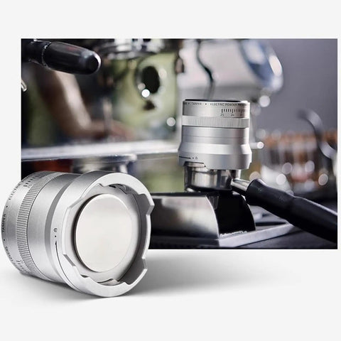 Heavy Duty Electric Espresso Tamper Game Changer With 16 Adjustable Pressure Levels Auto Compresses 58mm Portafilter Locks In Your Perfect Shot Daily Black Finish displayed next to espresso machine.