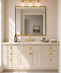 Bathroom vanity with Brushed Satin Gold Wide Base Bifold Closet Door Knobs 4 Pack installed on beige cabinets and mirror frame.