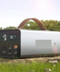 Rugged Portable Power Station With 200W Output For Trail Camping And Emergency Prep Multiple Usb Ports on grass.