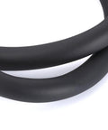 Close-up of black nitrile rubber foam tubing, part of 2 Pack 1-1/4 Inch Pipe Insulation Foam Tubing 6 Ft Long With 2 Inch Outer Diameter And 3/8 Inch Wall Thickness Perfect For AC Units, Guitar Stands, Exercise Machines, Roof Racks And Other Gear Protection.