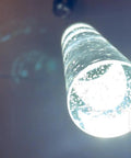 Slick Modern Pendant Light With LED Bubble Crystal Shades for Kitchen Island, close-up of illuminated shade, Chrome Mini Single Island Fixture.