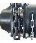 Close-up of Sturdy One Ton Manual Pulley Chain Block Hoist Crane Lifting Machine With Durable Black Finish and metal chain.