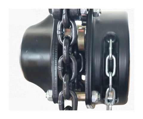 Close-up of Sturdy One Ton Manual Pulley Chain Block Hoist Crane Lifting Machine With Durable Black Finish and metal chain.