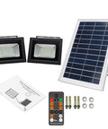 JUDYSSY Outdoor Remote Solar Flood Lights Led Solar Panels with Charging Indicator, includes two flood lights and remote control.