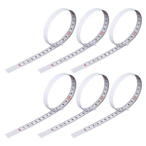 Six Pack Adhesive Flexible Tape Measures Set, 1m And 2m Lengths, Self Sticking Ruler Tools For Home Projects, rolled and arranged in a row