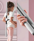 Posture Corrector Stick For Back Pain Relief And Spine Alignment Upper And Lower Back Stretcher being used by a young girl and detailed close-up