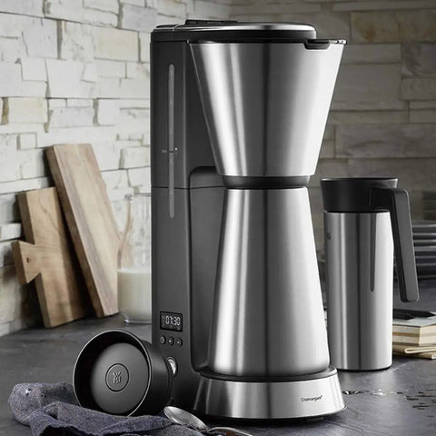 Fully Automatic Bean To Cup Coffee Maker With Integrated Milk Steam Wand in sleek stainless design on kitchen counter.