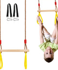 Child playing on 16 Inch Wooden Trapeze Bar With Rings For Swing Sets Adjustable Height From 39 To 67 Inches Gym Hanging Accessories