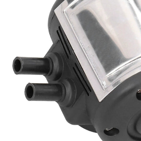 Close-up of Two Outlet Milking Pulsator For Cow And Goat Milking Machines, showing dual outlets and durable plastic housing.