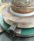CNC Automatic Welding Positioner Featuring A Smooth Zero To One Hundred Degree Rotary Turntable Thirty Kilogram Heavy Duty Table close-up of welding seam and securing setup.