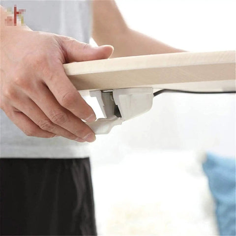 Adjustable Height Rolling Laptop Stand With Spacious Work Surface Smooth Caster Wheels, user adjusting height of desk panel.