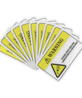 Stack of High Visibility PVC Safety Warning Stickers For Machinery And Equipment Self Adhesive Decals For Warehouse Construction Sites And Shop Floors