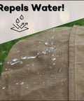 Close-up of water droplets on Waxed Canvas Haversack Outdoor Bushcraft Shoulder Bag And Messenger Satchel Water Resistant Built To Last Utility Pack For Gardening And Foraging Large 17 By 15 Inches Dark Khaki, showing water resistance.