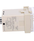 3D LED Digital Time Relay For AC220V Industrial Automation, Adjustable Timing And Cycle Delay Control Unit, Digital Setting Interface, Pro Grade Delay Module For Machinery And Equipment, beige side view with pins