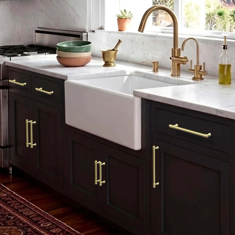 Brushed Gold Cabinet Pulls 5 Inch Zinc Alloy Handles Set of 10 for Kitchen Cabinets Bathrooms Drawers Cupboards and Wardrobes Go To Sleek Durable Easy Install Hardware installed on dark kitchen cabinets under white countertop