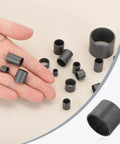 Close-up of 6 Pcs POM Sleeve Bearings 30mm ID By 34mm OD By 26mm Length Self Lubricating Oilless Black Bushings in hand and laid out