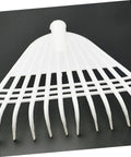 Close-up of white rake head from Two Pack Long Handle Gardening Rake With Sturdy Latex Soil Rake For Lawn And Garden Leveling Heavy Duty Agricultural Tool
