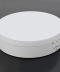 Electric Rotating Display Stand For Jewelry Watch Cosmetics And Toys 3 Speeds 360 Turntable With USB Charging Port white ABS material side view