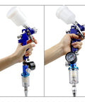 Professional Spray Gun Pressure Regulator Featuring A No Nonsense Oil Water Separator Filter To Keep Damp Moisture Out and guarantee a straight up slick finish on every detail job, held in hand.