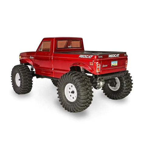 Back view of 1/10 Scale Rock Crawler with High Torque 4WD Portal Axles, waterproof electronics on rugged tires, hobby-grade design.