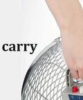 Hand holding the handle of a Heavy Duty 21 Inch High Velocity Electric Floor Fan Built Different With Eight Crank Speeds And Rugged Steel Blades.