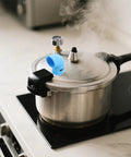 Sky-blue silicone steam diverter on pressure cooker, diverting steam away, Silicone Steam Diverter For Pressure Cooker High Temperature Resistant Exhaust Vent Tube 6 Pieces Kitchen Steam Hose Set With Countertop Protection And Cabinet Protection Flexible Quick Install Steam Direction Control.