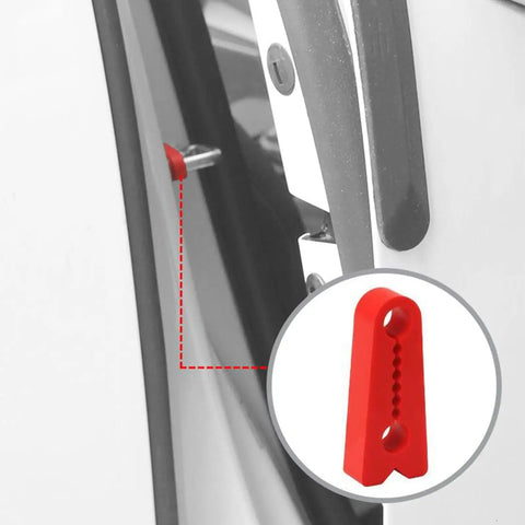 Close-up of red silicone door damper pad in vehicle door channel, part of the Set Of Four Silicone Auto Door Dampers Knock Out Heavy Slam Noise And Vibes With Grippy Hold For Trucks Suvs Vans And Rv Vehicles To Deliver A Totally Slick Quiet Close Every Drive.