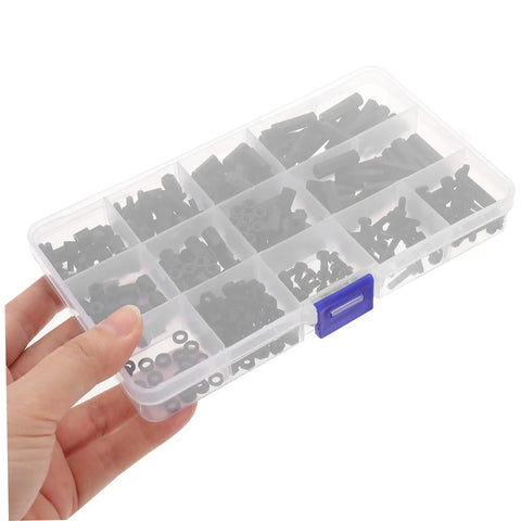 Hand holding durable nylon standoff and screw kit with washers and nuts for PCB flight controllers and motion sensors in a clear box