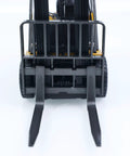 Mini Warehouse RC Forklift Model 9925 With Realistic Light And Sound Effects Precise Steering Lift Lower Function Plus Remote Control Operation For Indoor Play front view showing realistic forks and wheels.
