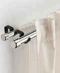 Double Curtain Rod Bracket Set 3 Pack Wall Mounted Metal Holders For 1 Inch Curtain Rod Black Finish with two curtain rods side view